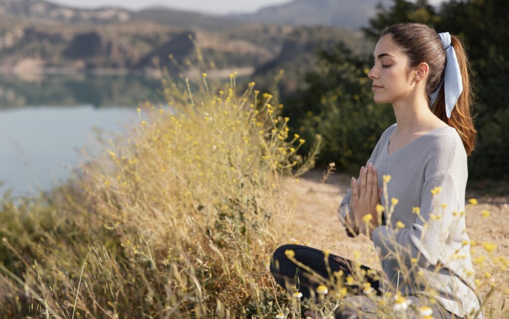 young-woman-meditating-nature