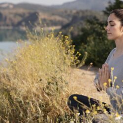 young-woman-meditating-nature